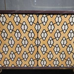 Rounded Two-Door Sideboard with Geometric Patterned Panels Dark Natural Wood Veneer Top and Gold-Tone Openwork Metal Base